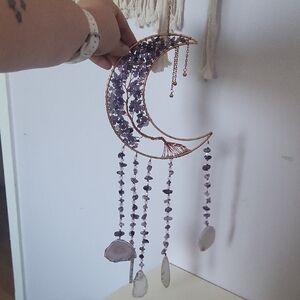 Purple and Gold Crescent Moon Art with Intricate Design